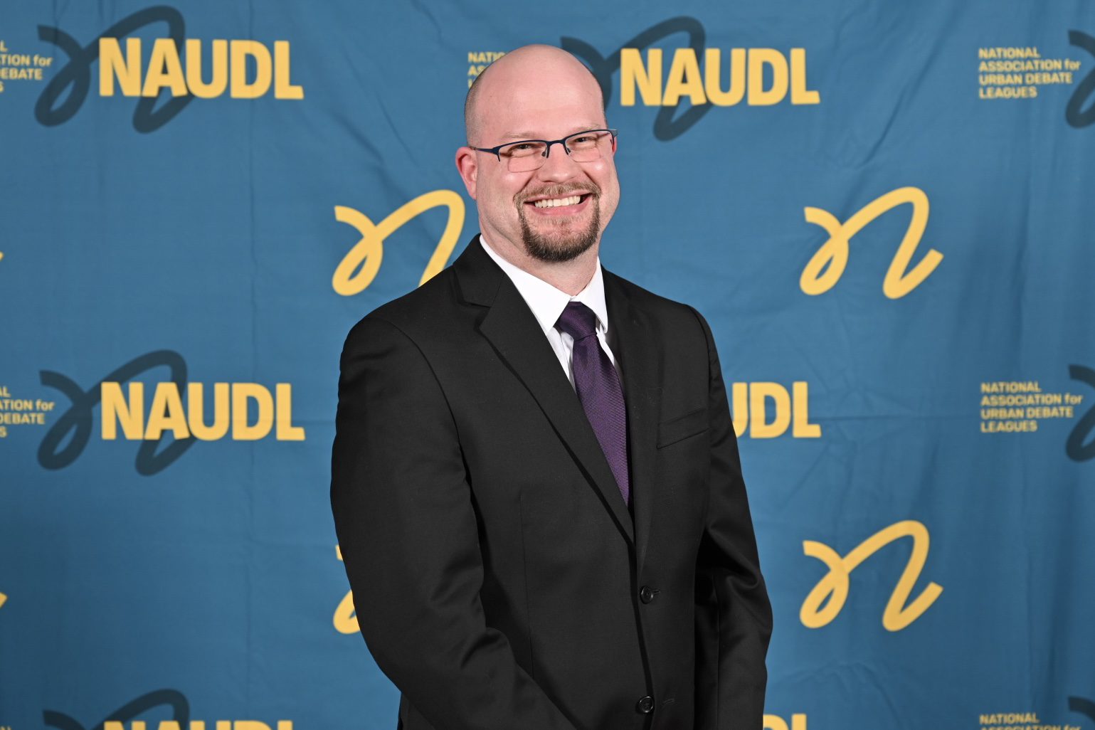 Smiling man in formal attire